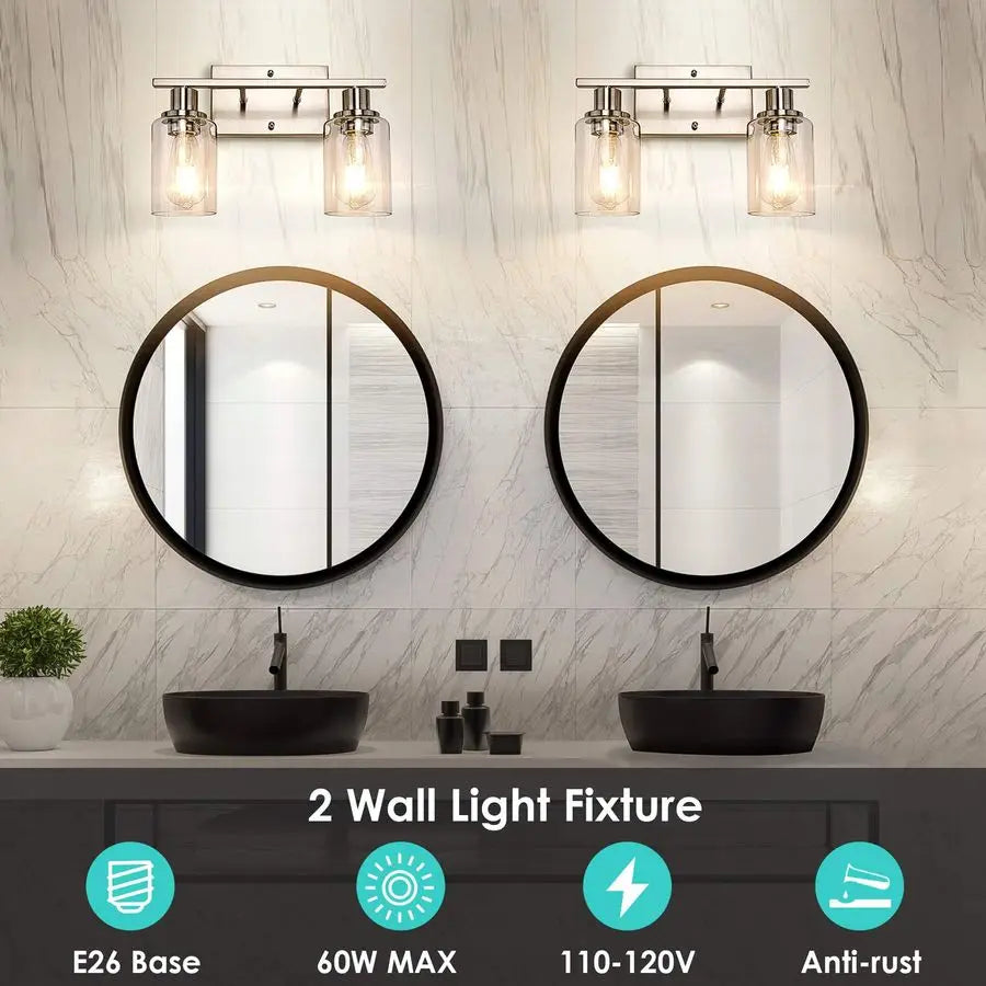 Two Light Bathroom Vanity Lights With Clear Glass Shades Over Mirror